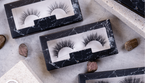 Trimming strip lashes from the outer corner