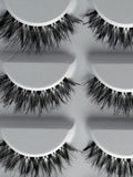 Wispy strip false eyelashes on a lash tray, lightweight for everyday wear